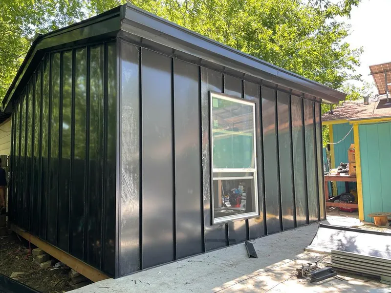 Black standing seam metal wall panels for Metal Roof Installation in Lynwood